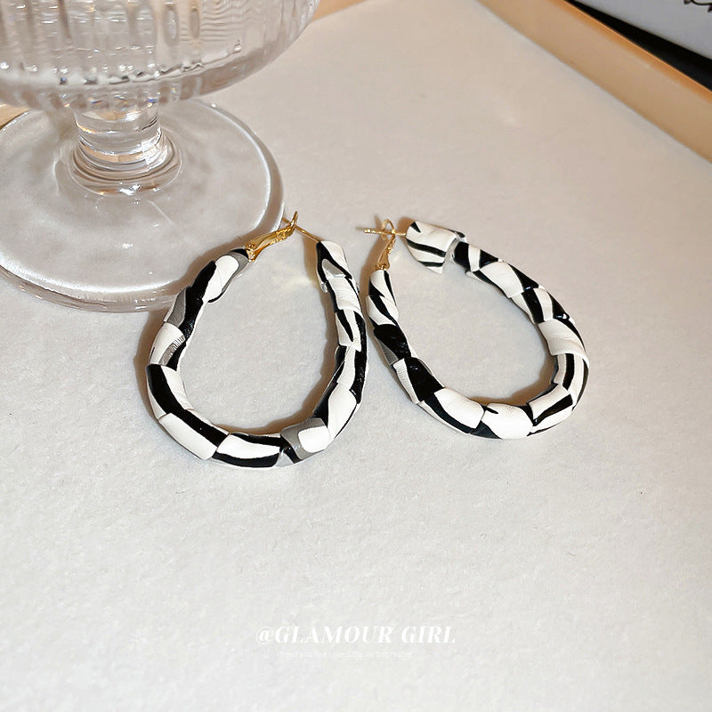 Women's Leather Personalized Design High Sense Ear Earrings