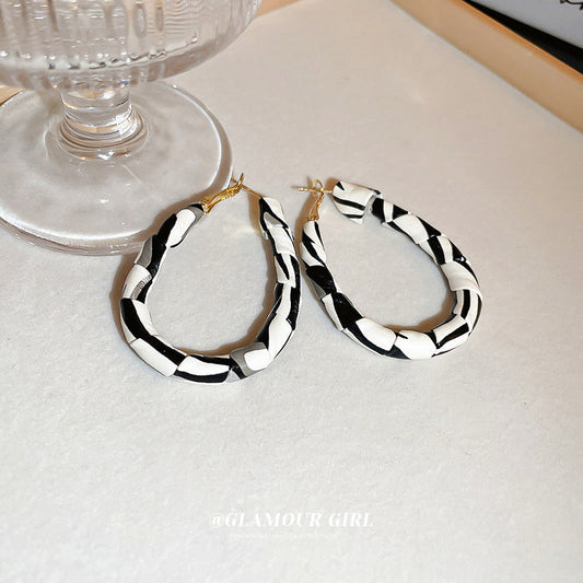 Women's Leather Personalized Design High Sense Ear Earrings