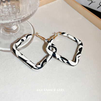 Women's Leather Personalized Design High Sense Ear Earrings