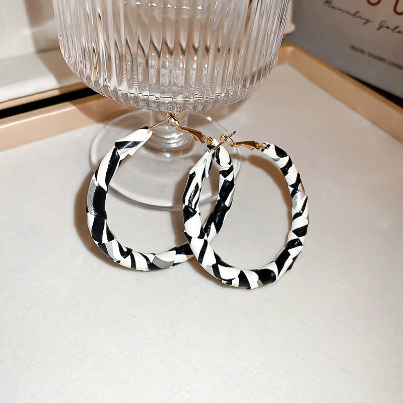 Women's Leather Personalized Design High Sense Ear Earrings