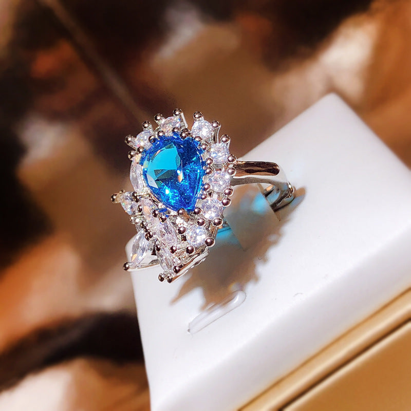 Live Simulation Sapphire Bright Oval Open Rings