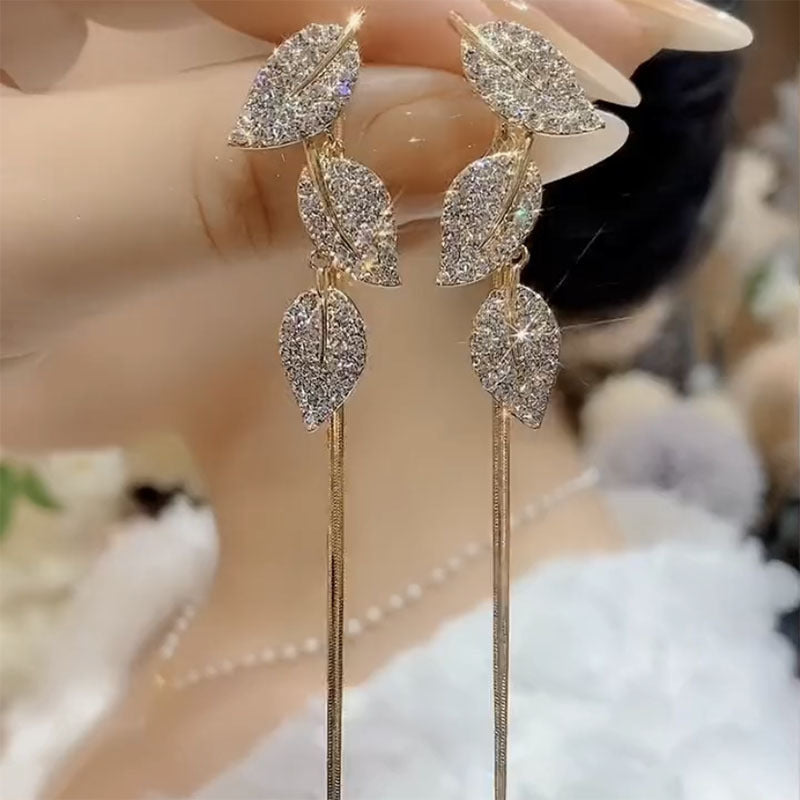 Multiple Ways To Wear Leaf Tassel High Earrings
