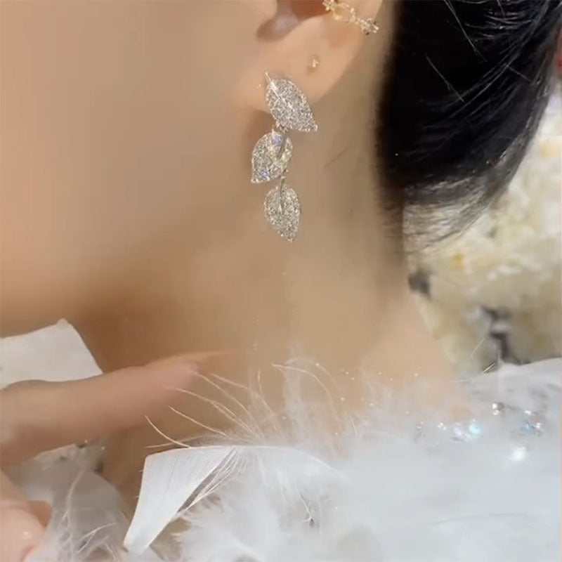 Multiple Ways To Wear Leaf Tassel High Earrings